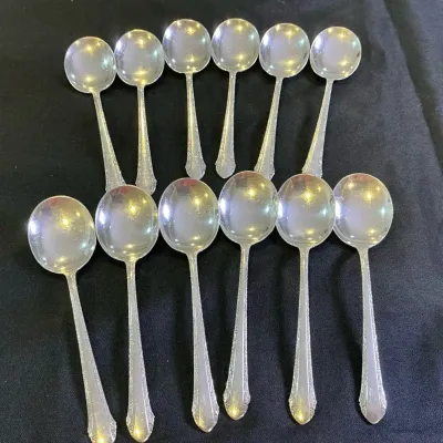 (12) Sterling Silver Alvin Chased Romantique Pattern Soup Spoons (408g)