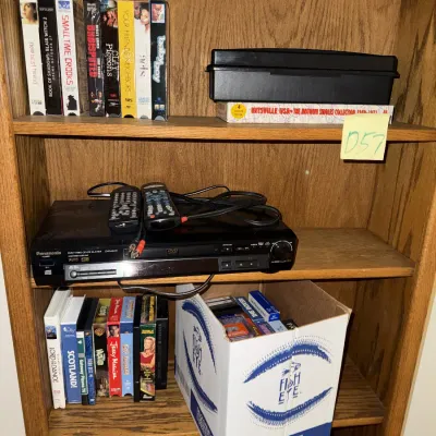Sale Photo Thumbnail #1337: VHS tapes, DVDs, player, etc.