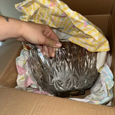 Sale Photo Thumbnail #1704: Mugs are all wrapped underneath bowl