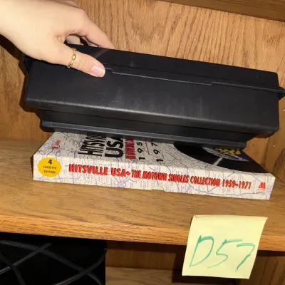 Sale Photo Thumbnail #1339: VHS tapes, DVDs, player, etc.