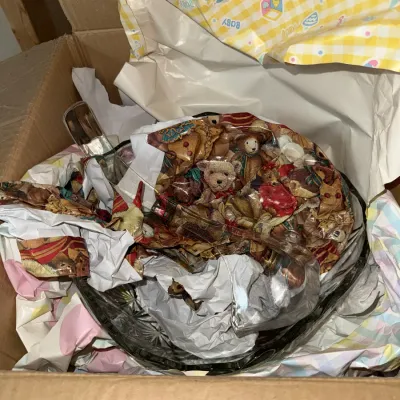 Sale Photo Thumbnail #1703: Mugs are all wrapped underneath bowl