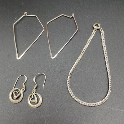 Sale Photo Thumbnail #218: Only the small earrings are stamped