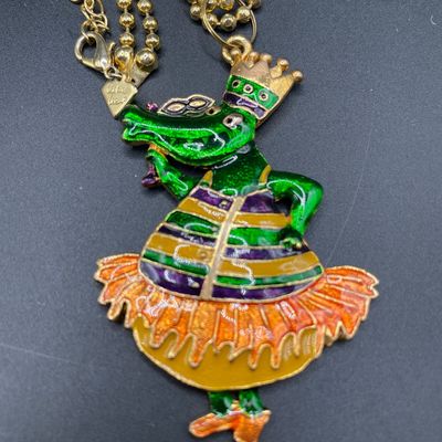 Sale Photo Thumbnail #156: Be the life of the party with a hippo bottle opener necklace
Butterfly chain
Gator Mardi Gras pendant on cookie Lee chain