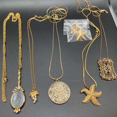 Sale Photo Thumbnail #236: Gold tone necklaces and post earrings