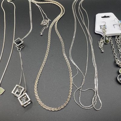 Sale Photo Thumbnail #254: Silver tone necklaces