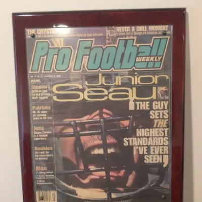 Framed copy of Pro Football Weekly newspaper November 13, 2000, star linebacker Junior Seau