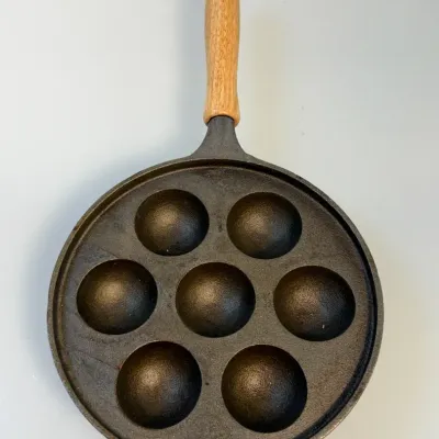 Sale Photo Thumbnail #164: Cast iron aebleskiver pan