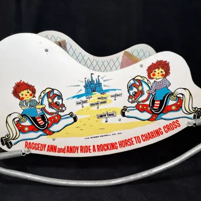 Sale Photo Thumbnail #94: Raggedy ann and andy ride a rocking horse to charing cross