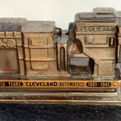 Sale Photo Thumbnail #42: Cleveland automatic machine company commemorative paperweight