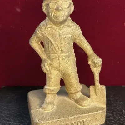 Sale Photo Thumbnail #62: Sandy coal miner figurine doorstop made by midwest foundry