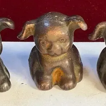 Sale Photo Thumbnail #36: Hines hines pups bucki cast iron advertising paperweights