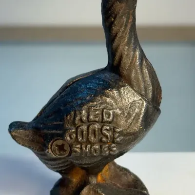 Sale Photo Thumbnail #9: Vintage red goose shoes cast iron coin bank