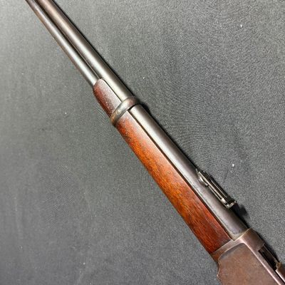 Sale Photo Thumbnail #452: This beautiful lever-action carbine is widely known as “The Gun That Won the West.” It features a 20-inch barrel, and holds 15 rounds of ammunition. It fires .44 Winchester Center Fire (.44-40) caliber ammo, a revolutionary round that could be used in