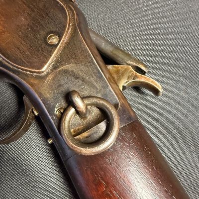 Sale Photo Thumbnail #455: This beautiful lever-action carbine is widely known as “The Gun That Won the West.” It features a 20-inch barrel, and holds 15 rounds of ammunition. It fires .44 Winchester Center Fire (.44-40) caliber ammo, a revolutionary round that could be used in