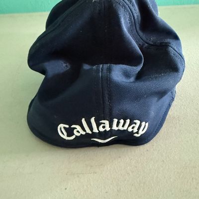 Sale Photo Thumbnail #432: This is a Callaway brand cap. The autograph is on the brim, in what appears to be metallic Sharpie, or other marker. This piece has not been authenticated. The size is believed to be large. Pre-auction estimate: $150-$300.