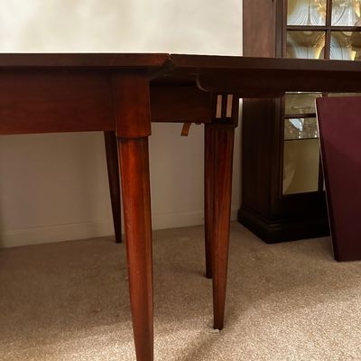 Sale Photo Thumbnail #3: Beautiful vintage Willett dining room set featuring a long, rectangular dining table with two extension leaves and eight matching dining chairs.

The set has a clean, timeless mid-century modern/Danish-inspired aesthetic, with warm reddish-brown wood tone