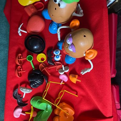 Sale Photo Thumbnail #35: 30 plus parts (including arms and earrings) for Mr and Mrs Potato Heads 
Mint condition
Bucket does not have lid.