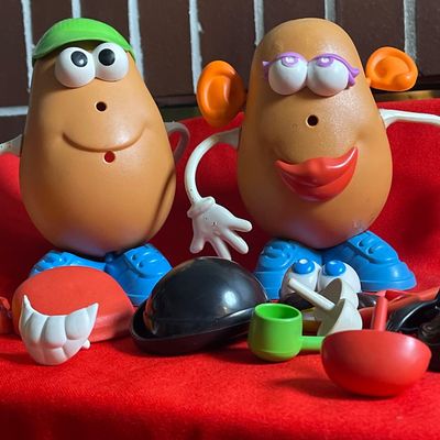 Sale Photo Thumbnail #32: 30 plus parts (including arms and earrings) for Mr and Mrs Potato Heads 
Mint condition
Bucket does not have lid.