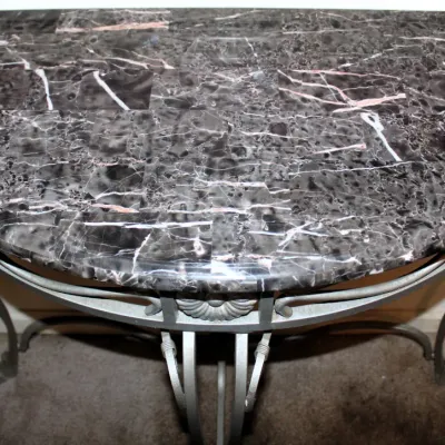 Half-Circle Console Table
$100.00
38.5in x 16.5in. x 32in.

- Dark Faux Marble Top
- Silver-tone Metal Base
- Decorative Rosette Accents
