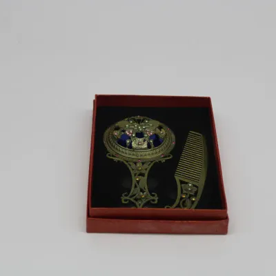 Vintage Bronze hand mirror + Comb set 
$20.00