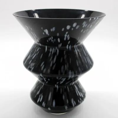 Vintage BX Glass Vase
9in. Tall
$40.00
- White designs all throughout the vase.