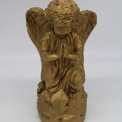 Gold finished resin kneeling angel figurine
$20.00
13" tall