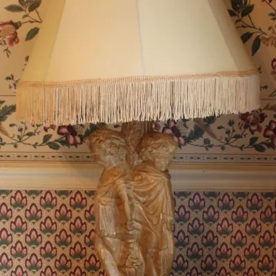 Vintage Figural Table Lamp ft. Sculpted Cherub Figures and Pleated Fabric Shade w/ Fringe
$35.00
-37in. Tall