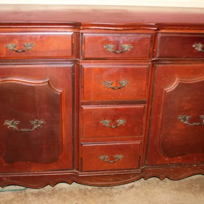 Vintage Wooden Sideboard
$350.00
50.5in x 19.5in. x 33.5in.

- Deep Wood Finish
- Ornate Metal Hardware