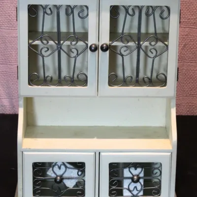 Small cream colored wood wall cabinet 
$20.00
13" x 6" x 17"