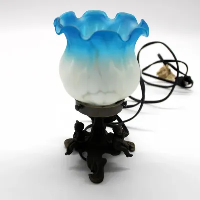 Vintage Accent Lamp
$25.00
- Blue and White Frosted Glass