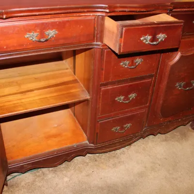Vintage Wooden Sideboard
$350.00
50.5in x 19.5in. x 33.5in.

- Deep Wood Finish
- Ornate Metal Hardware