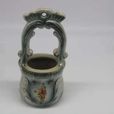 Vintage Iridescent Lusterware ceramic wishing well planter with hand-painted details
$25.00