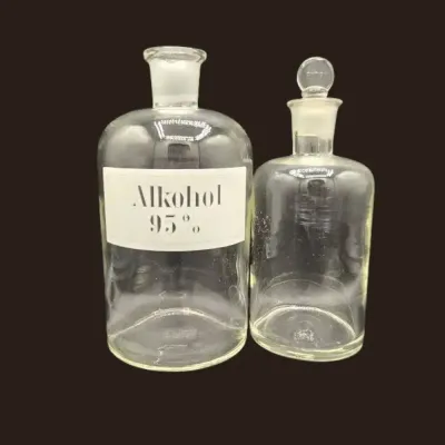 2 Vintage Apothecary Bottles With One Pyrex Stopper