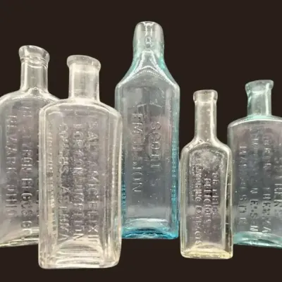 5 Antique & Vintage Embossed Glass Medicine Bottles