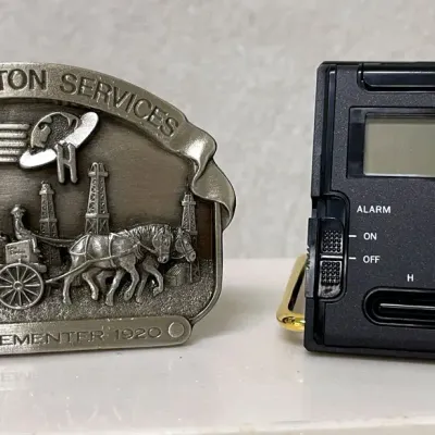 Halliburton Commemorative Buckle and Travel Clock