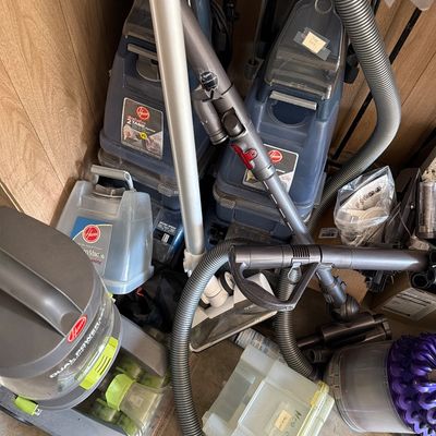 Sale Photo Thumbnail #190: Three carpet cleaners and two Dyson Vacuums.