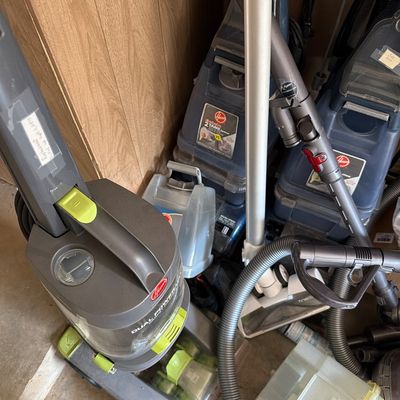 Sale Photo Thumbnail #188: Three carpet cleaners and two Dyson Vacuums.