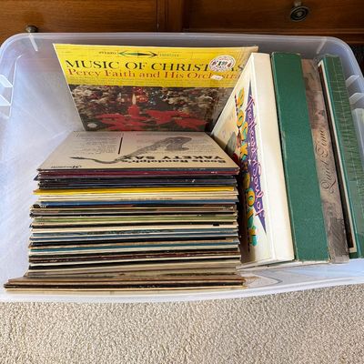 Sale Photo Thumbnail #87: Records, TVs, Cassettes, Books, VHS, and more. 

Cabinet and table not included.