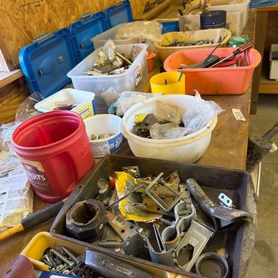 Sale Photo Thumbnail #296: Yard stuff, New casters, paint, misc screws and nails.
metal work table. and More.