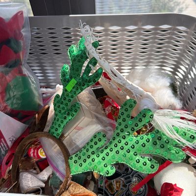 Sale Photo Thumbnail #163: Christmas Ornaments, Easter, Wrapping items, and more.

Shelves and gray baskets not included.