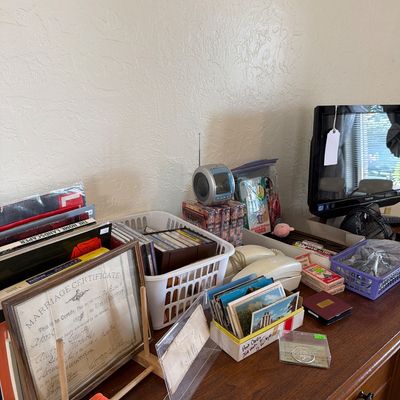 Sale Photo Thumbnail #83: Records, TVs, Cassettes, Books, VHS, and more. 

Cabinet and table not included.