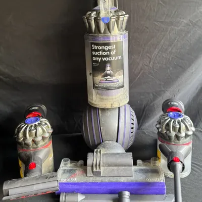 Assorted Dyson Vacuums And Accessories