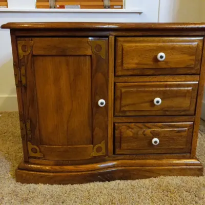 Vintage Solid Wood Cabinet with Brass Corner Accents & Porcelain Knobs