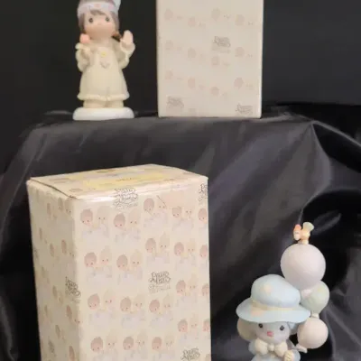 Precious Moments Pair - Fun Figurines 