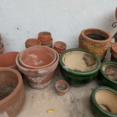 Bulk Estate Collection of Terra Cotta, Glazed Ceramic, and Decorative Planters with Wrought Iron 