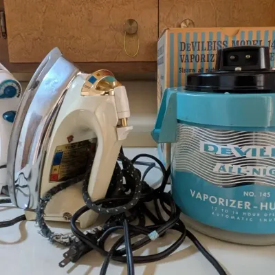 Vintage Small Appliance Lot: DeVilbiss Vaporizer, Mary Proctor Steam Iron, & Black + Decker Iron