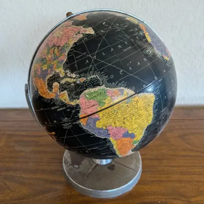 Vintage Replogle 12-Inch Starlight Black Ocean World Globe on Metal Stand (c. 1950s)