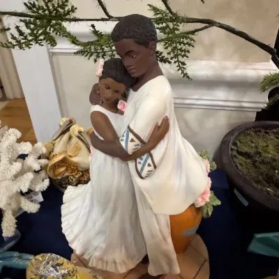 Ceramic figurine of embracing couple