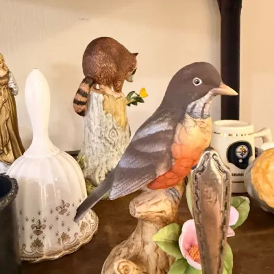 Porcelain robin figurine and decorative bells