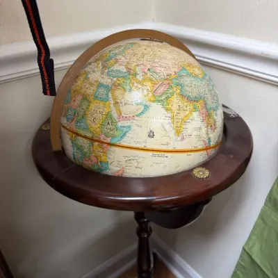 World globe on mahogany floor stand